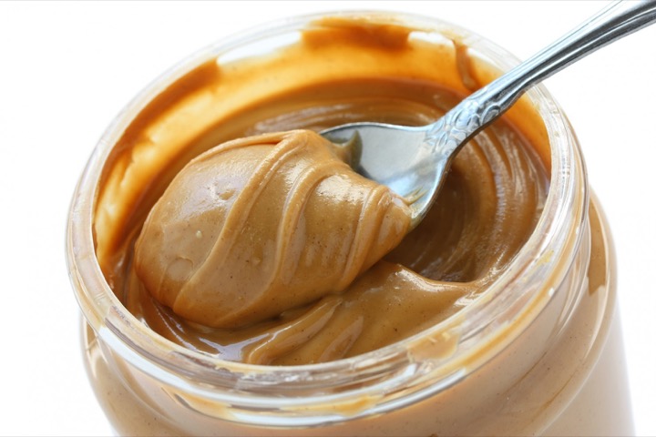 bigstock-an-open-jar-of-peanut-butter-w-31938017