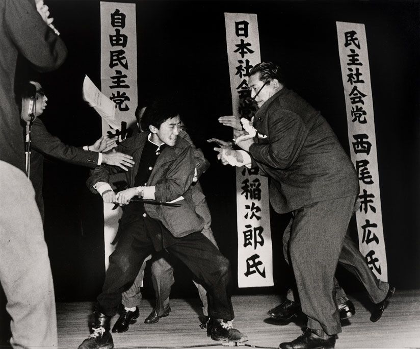 19 - Using a traditional Japanese blade 17-year-old Otoya Yamaguchi assassinates socialist politician Inejiro Asanuma in Tokyo Japa