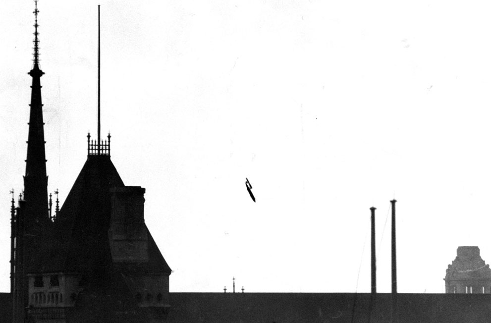 28 - A V-1 flying bomb buzzbomb plunging toward central London 1945